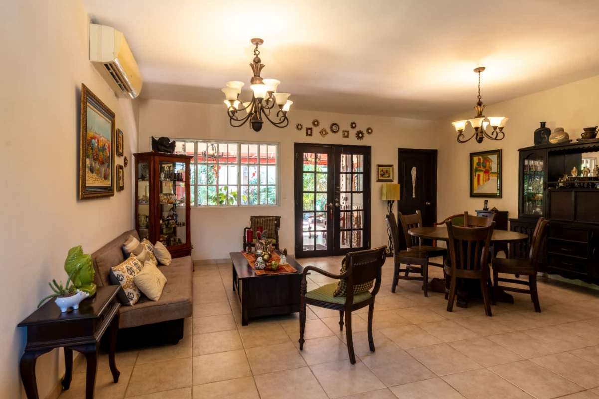 Traditional interior with tile floors, chandeliers, large windows and doors in Bosque de Cibeles Altos de Panamá
