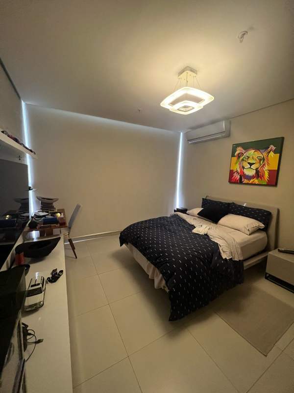 Master bedroom with large window city skyline view PH Marbella 47 Panama