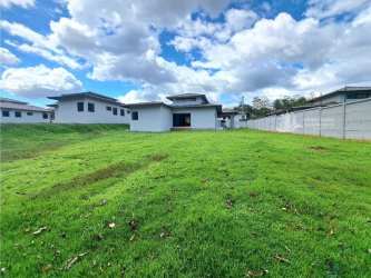 Kitchen with quartz countertops and soft close cabinets in new Coquito David house