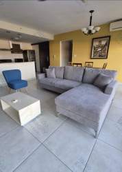 Open kitchen with granite countertops, appliances and storage in Woodlands Panama Pacifico