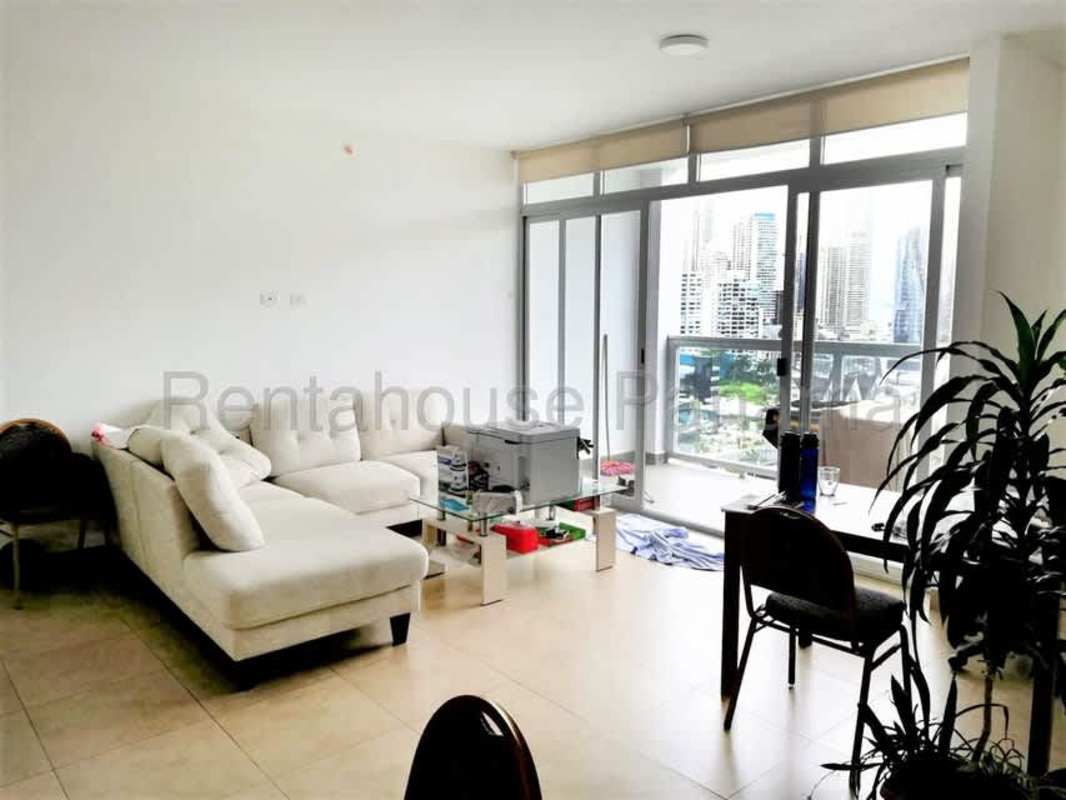 Sunlit bedroom with closet space at The One Tower San Francisco Panama apartment