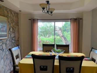 Dining with window garden views and traditional decor mountain home Boquete Panama