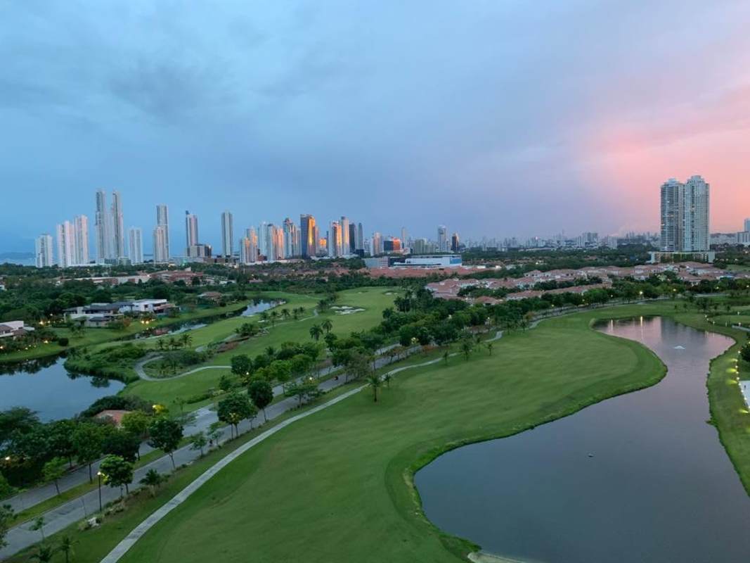 Modern gourmet kitchen with marble countertops, center island, stainless appliances in La Vista on the Green, Santa Maria Panama City