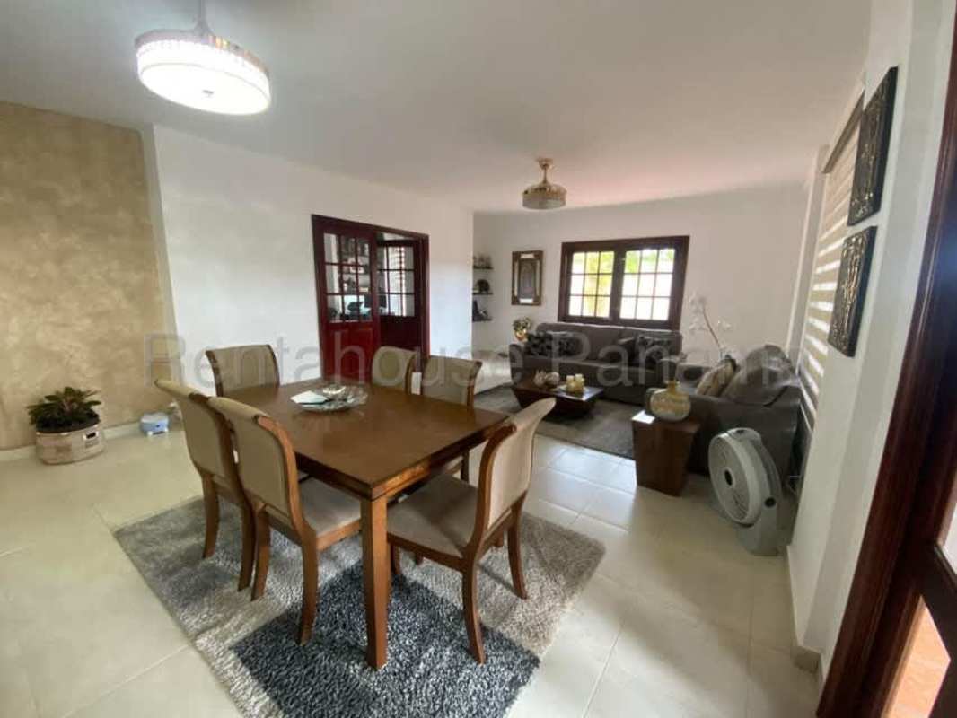 Large covered terrace with BBQ area and garden views in Villa Valencia Costa Sur Panama