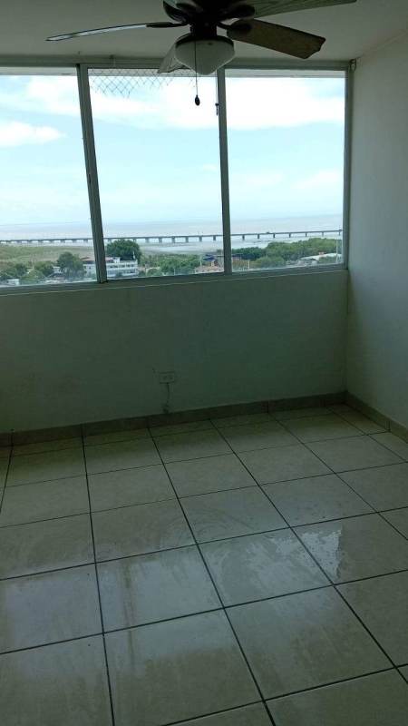 Bathroom with pedestal sink, mirror, tile floors and shower in PH Prisma Panama City