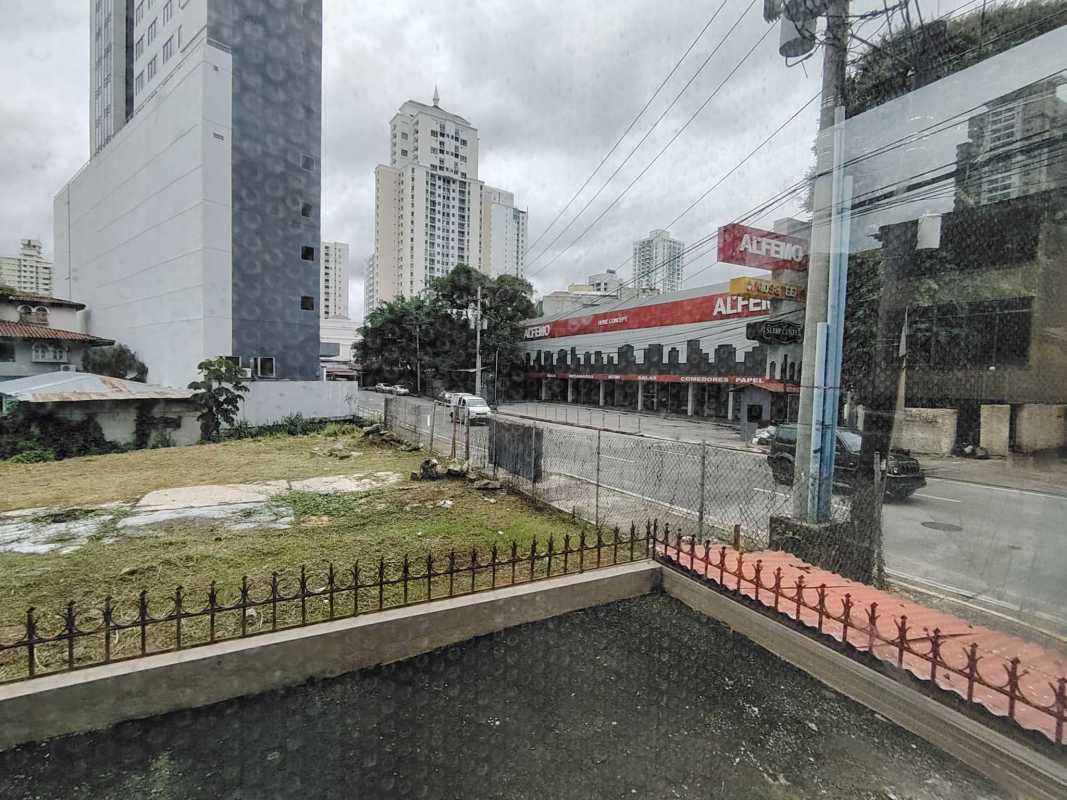 Vacant interior commercial unit with ceramic tiles and window view