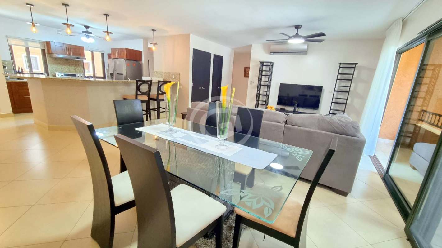 Modern kitchen with granite countertops stainless appliances at Embassy Club Courtyard Clayton Panama