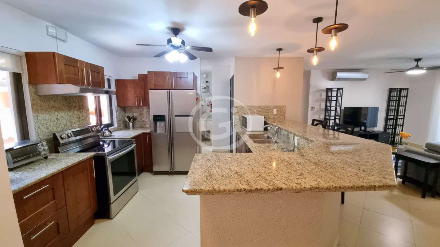 Balcony overlooks lush gardens courtyard Embassy Club Clayton Panama