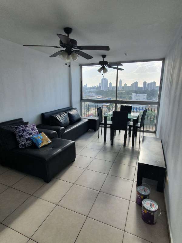 Bedroom with large window and city views in PH Alsacia Condado del Rey Panama