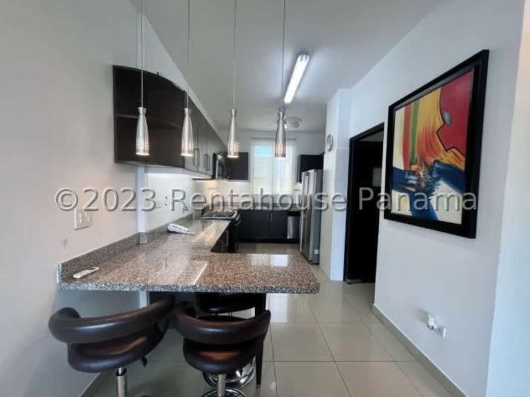 Open kitchen with granite breakfast bar PH Galeria Uno Obarrio Panama