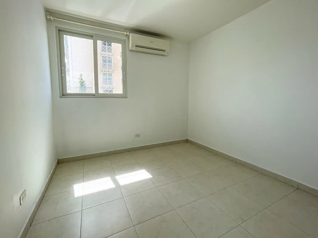 Living dining room with natural light and access to balcony in PH Torres de Versalles Panama