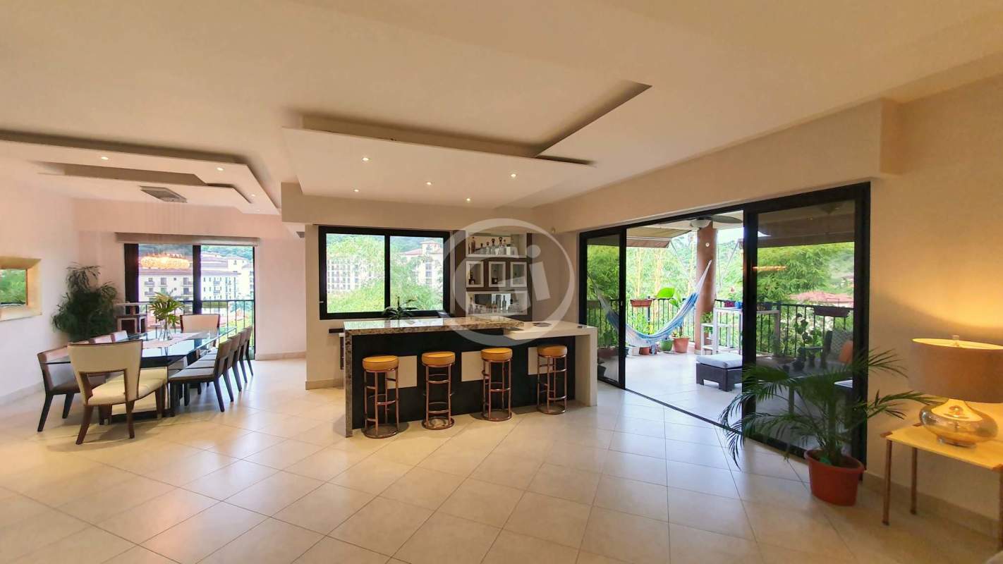 Luxury modern kitchen with granite island stainless appliances Embassy Club Penthouse Panama