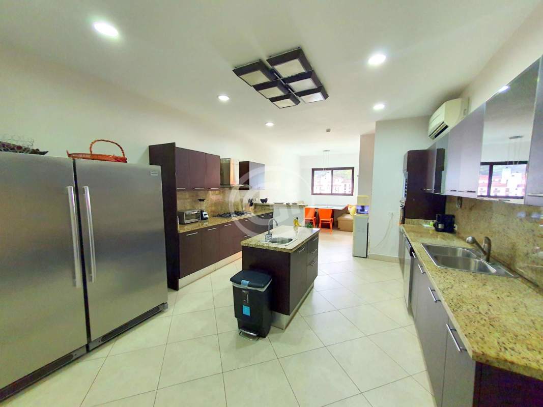 Spacious master bedroom balcony walk-in closet chandelier Embassy Club Penthouse Panama