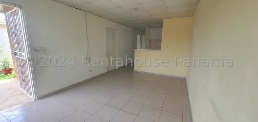 Simple kitchen tiled backsplash cabinets secure window La Chorrera peace Panama