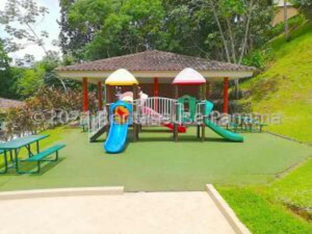 Open concept granite kitchen with appliances in Embassy Club Albrook Panama