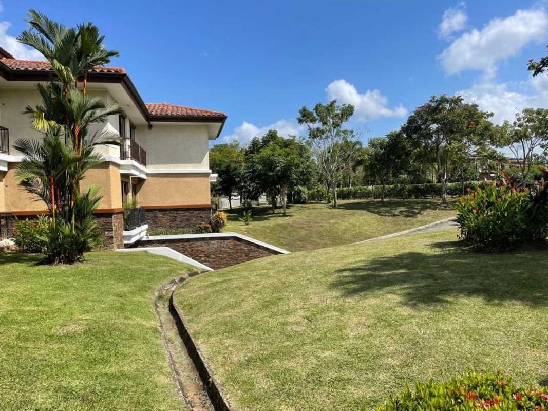 Mediterranean villa with stone facade, balconies, garden view in Embassy Club Clayton Panama City