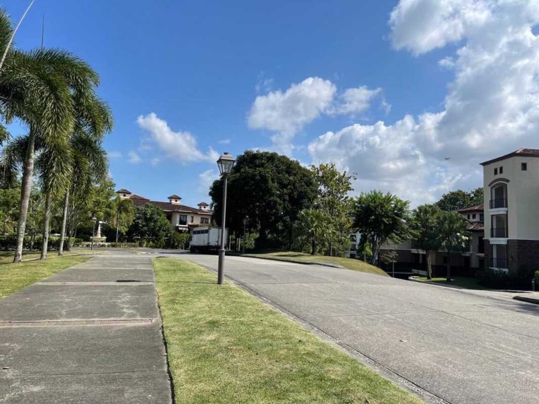 Mediterranean style residential townhouses with palms landscaping at Embassy Club Clayton Panama
