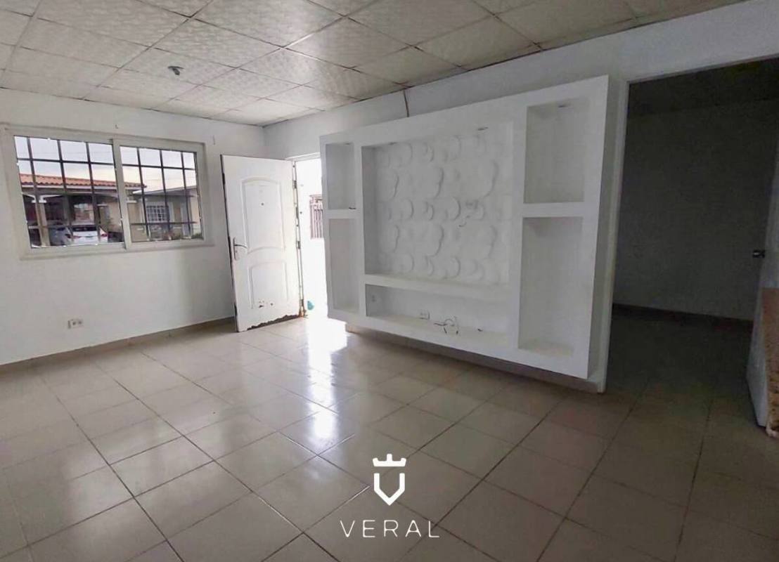 Living room with tiled floors, window and white built-in entertainment unit in Chilibre Panama