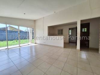 Open living and dining area with tile floor in La Chorrera house for sale Panama
