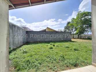 Spacious fenced backyard with grassy lawn La Chorrera house for sale Panama