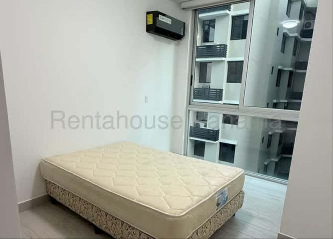 Bedroom with natural light, AC unit, modern finishes in PH Urbana Obarrio Panama