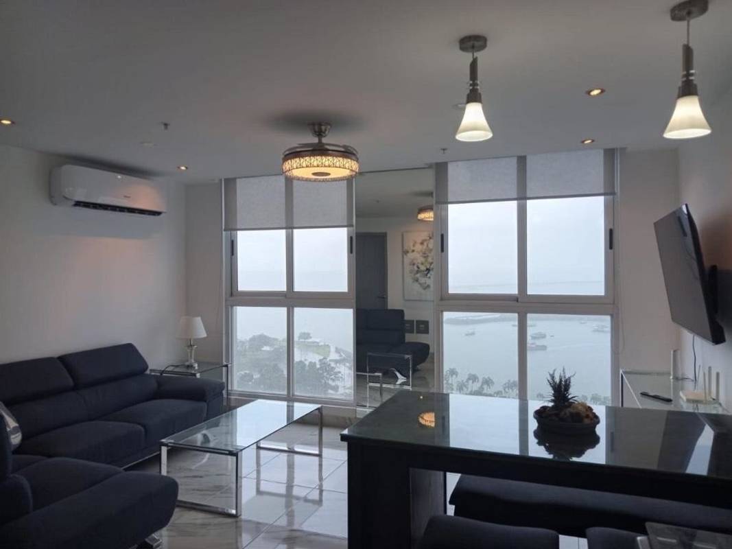 Luxury apartment floor-to-ceiling windows ocean view glass balcony marble floors PH The Sands Panama