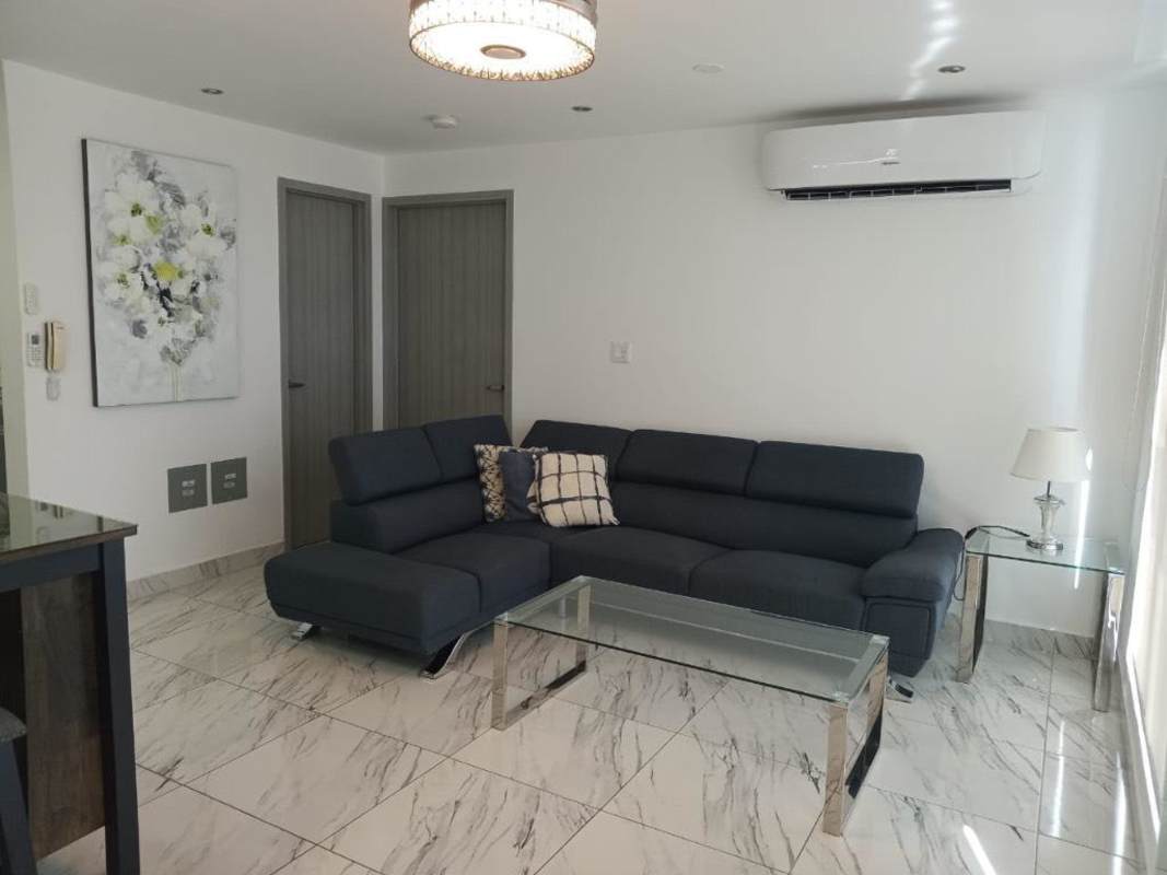 Modern furnished living room large windows ocean views marble tiles PH The Sands Panama for rent