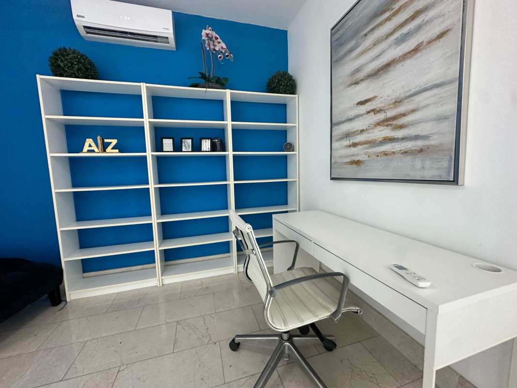 Furnished master suite with ocean view large window walk-in closet split AC PH Grand Tower Panama