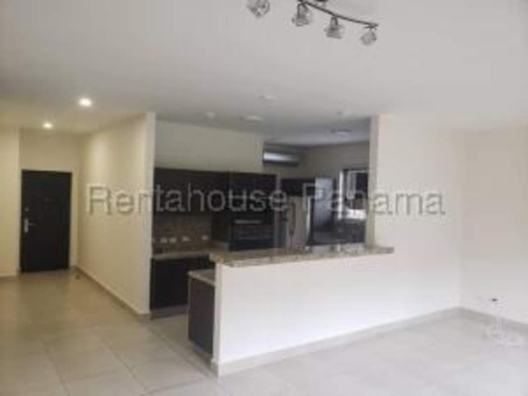 Covered balcony overlooking tropical gardens Embassy Club Clayton Panama City