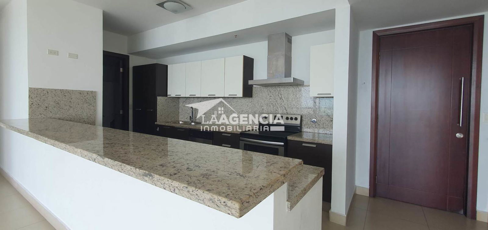 Contemporary bathroom design with large mirror and vanity in PH Oceanaire Panama City