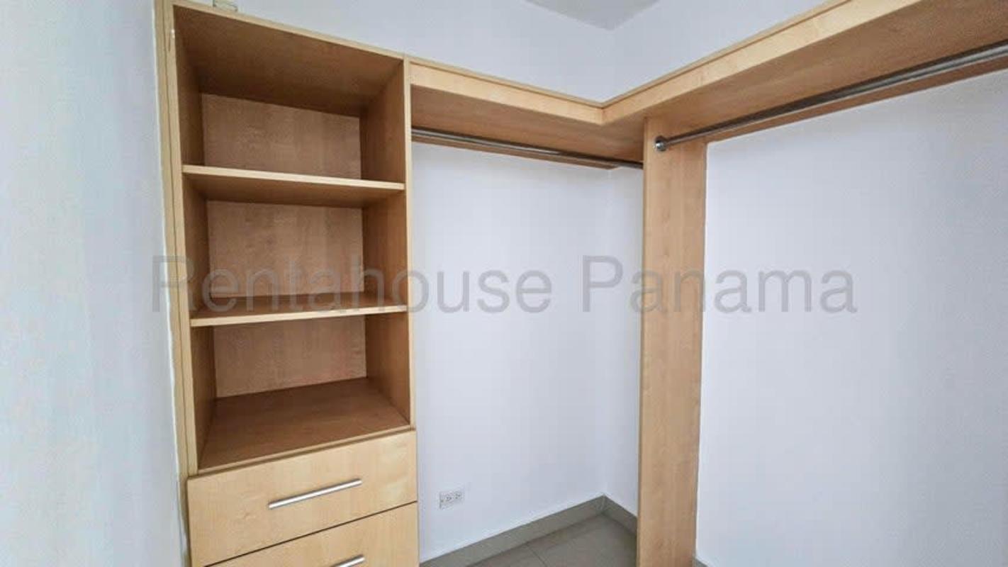 Bright master bedroom with large windows ocean view ceramic floors in PH Sevilla Panama City