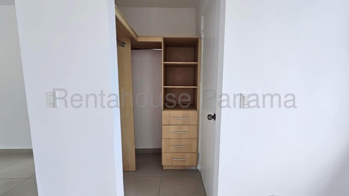 Modern kitchen with granite countertops, wooden cabinets, gas stove in PH Sevilla Costa del Este Panama City