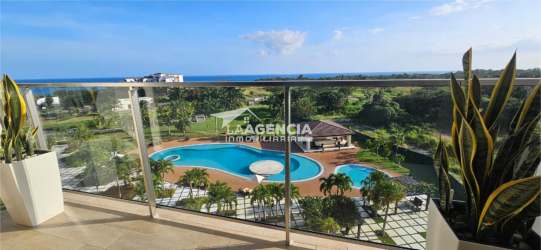 Modern open-plan living area with coastal decor near ocean in Casamar resort San Carlos Panama rental