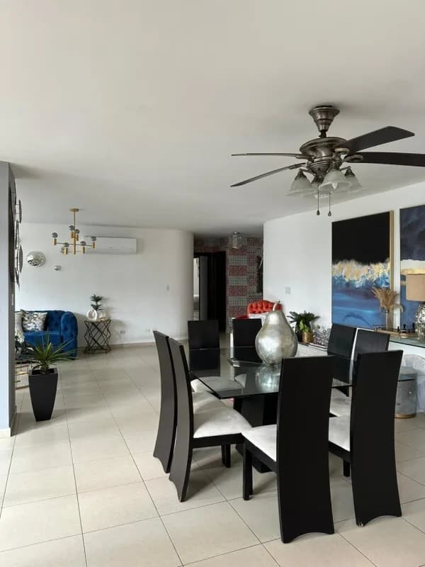 Dining area connected to living with contemporary decor PH Sol Marina