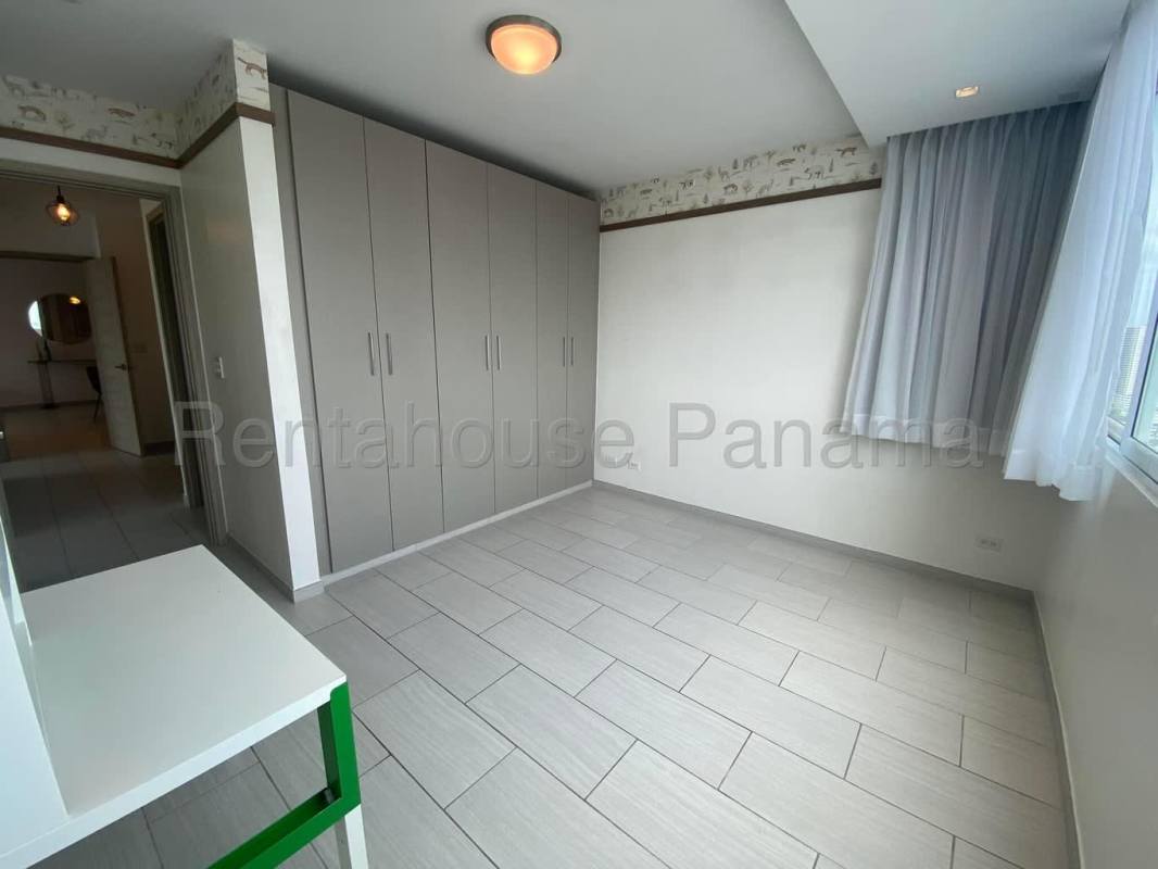 Spacious walk-in closet wood shelves The Towers 50th San Francisco Panama