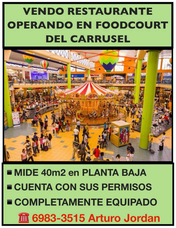 Indoor food court with central carousel amusement ride within Albrook Mall Panama