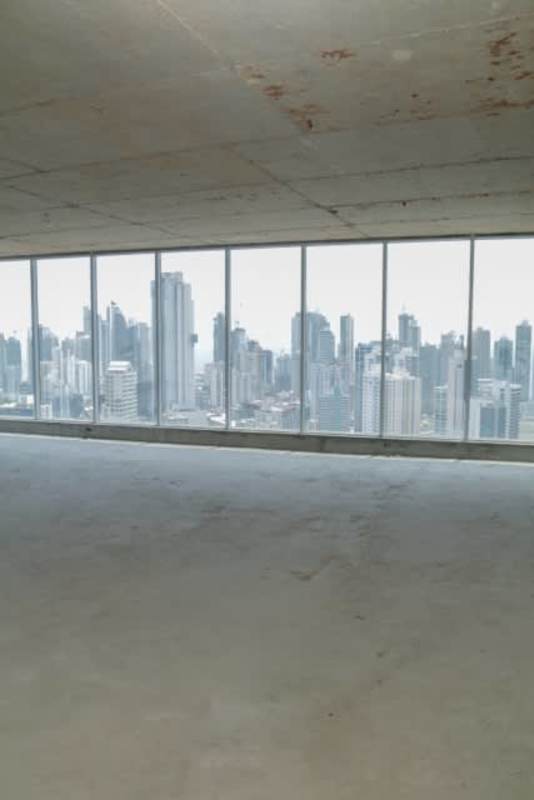 Floor-to-ceiling windows and unfinished floor provide skyline views Evolution Tower Panama City