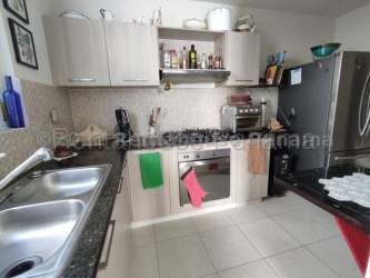 Bright open living dining room with ceiling fan tiled floors Costa Verde La Chorrera