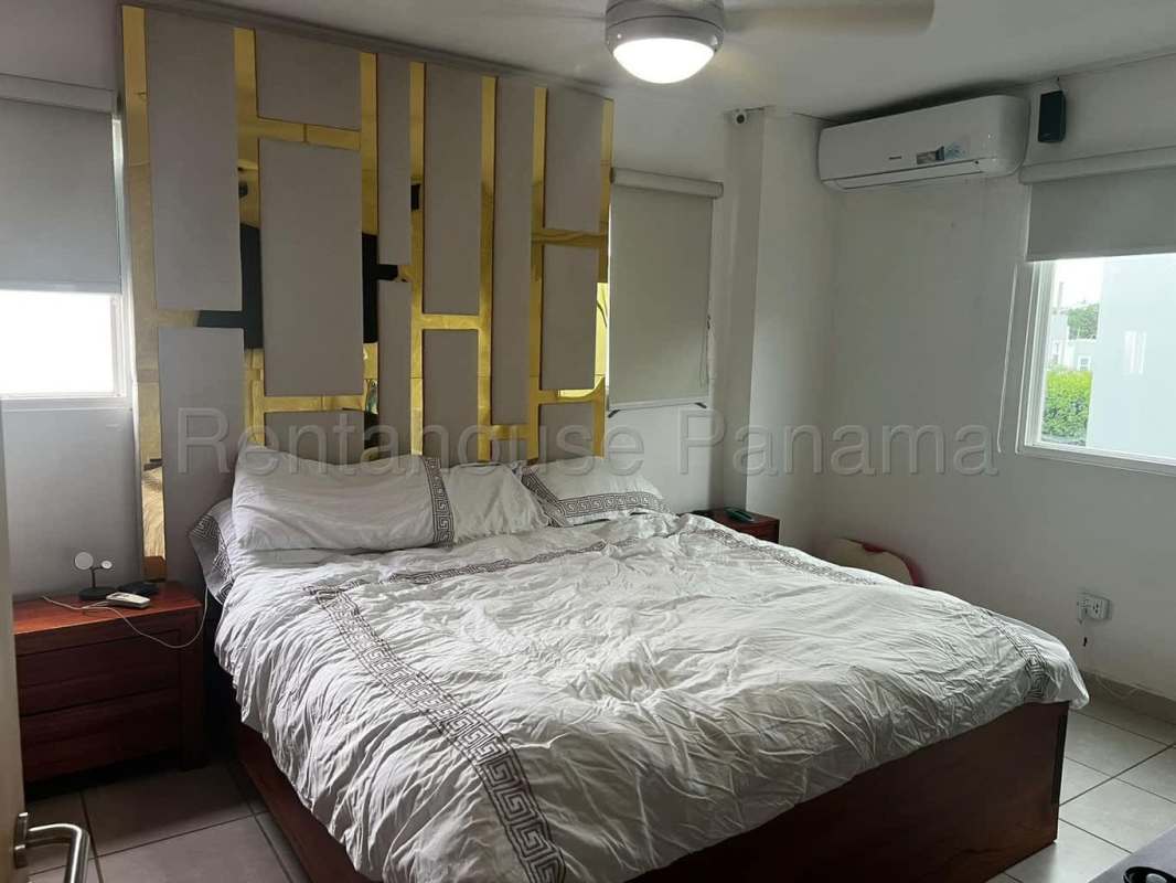 Kitchen with granite countertop, appliances, cabinets in duplex rental Brisas Norte Panama City