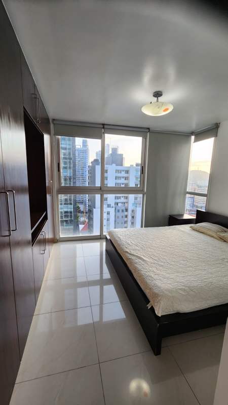 Furnished bedroom with large window city view apartment in PH Belle View Panama