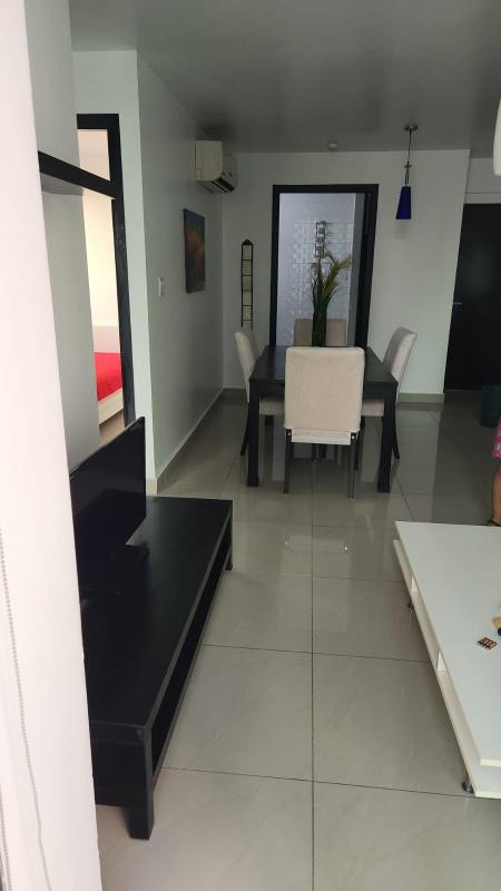 Open concept living dining area in furnished PH Belle View Panama City