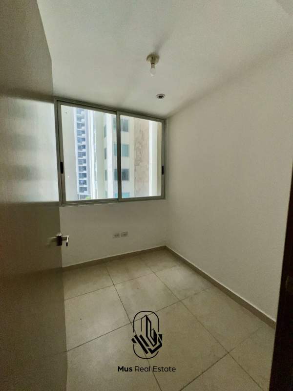 Granite countertop kitchen with cabinets and gas stove in PH Bayside Panama