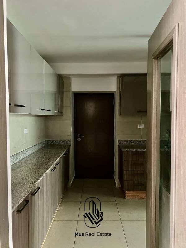 Bright master bedroom with closet and ocean view in luxury PH Bayside Costa del Este Panama