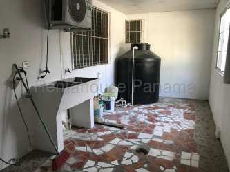 Bright living area with ceramic tile floors and large windows Jardines de Mastranto Panama