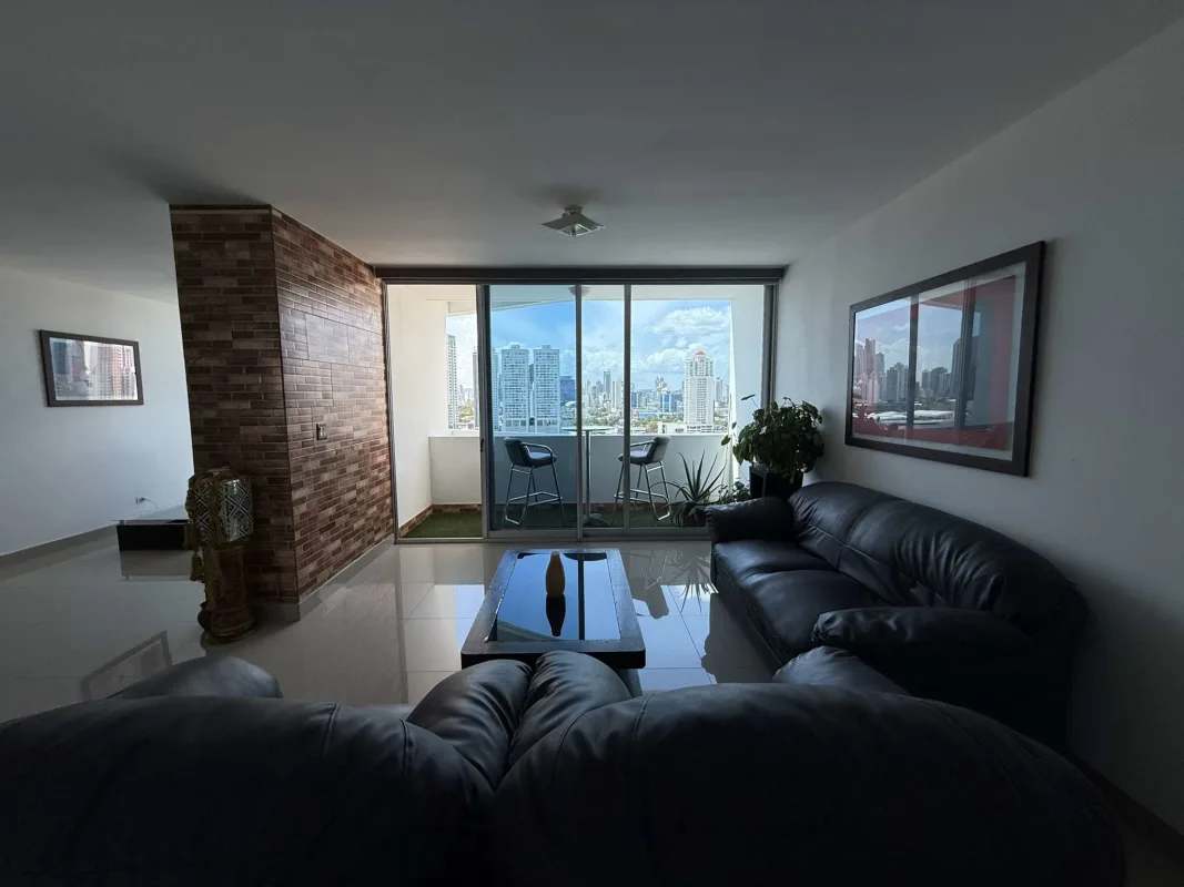 Bright living area with panoramic skyline views and balcony at PH Infinity San Francisco Panama