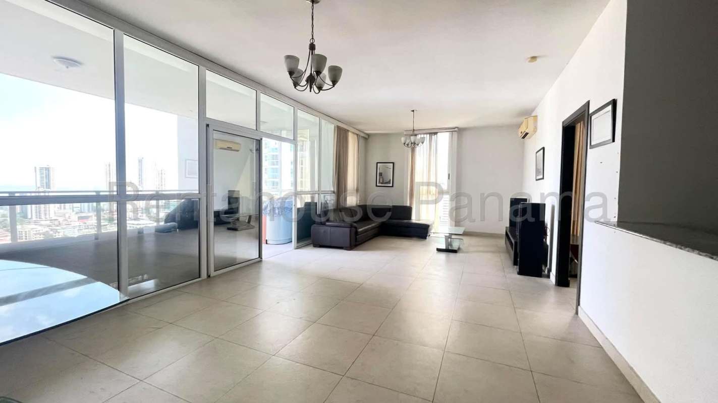 Apartment kitchen with granite countertops and dark cabinetry PH San Francisco Terrace Panama City