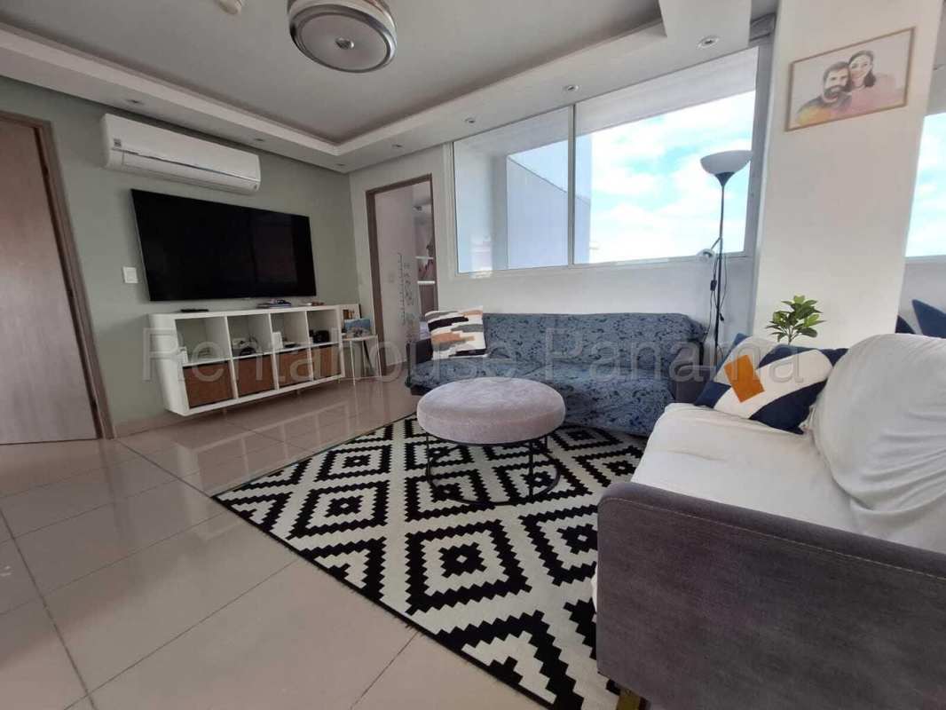 Open dining and living space with green nature backdrop Ancon Reserve Panama