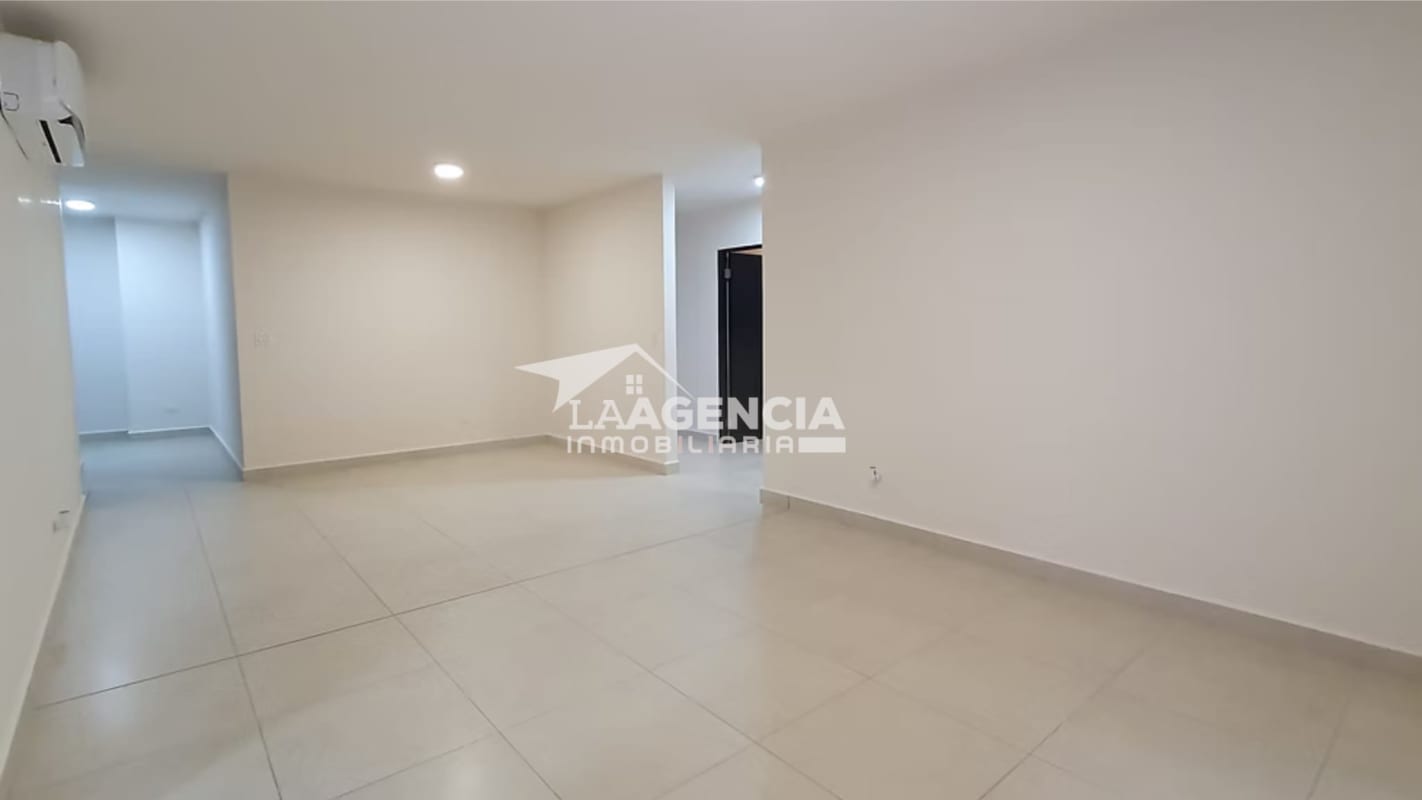 Large living area with neutral tiles, recessed lighting, split AC Embassy Village Albrook
