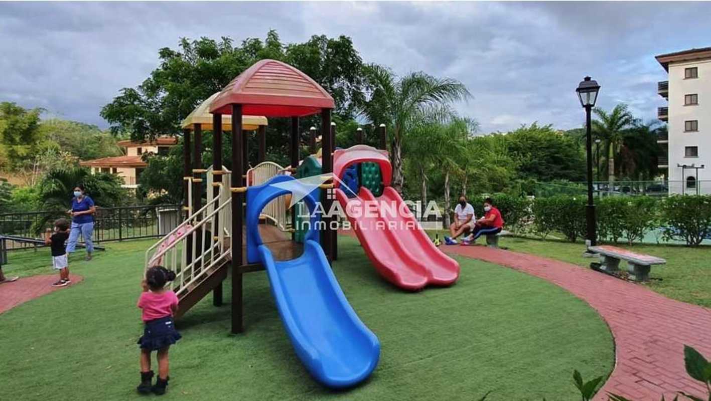 Children's playground surrounded by gardens at Embassy Village Panama
