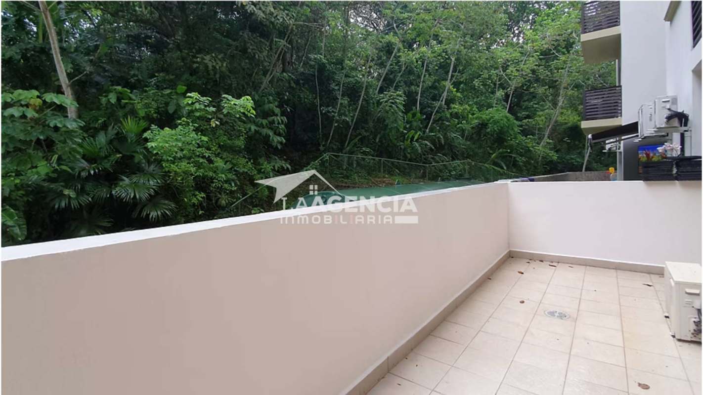 Large tiled terrace overlooking dense rainforest at Embassy Village Panama